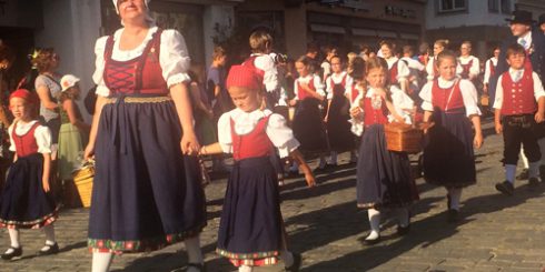 Locals from Straubing walking through the city during the Gäuboden Festival