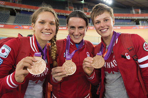 Tara Whitten, Gillian Carleton, Jasmin Glaesser showing off their Olympic cycling medals